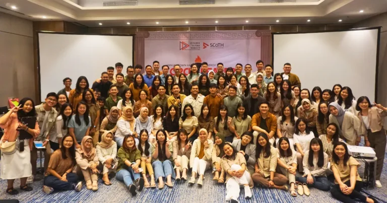 Team enjoying a warm and memorable movie night to end the year